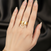 Bague doré avec coeur pendant